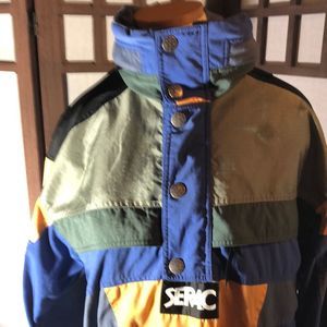 Vintage Serac size 36 heli/ski jacket color block of blues, greens, and gold